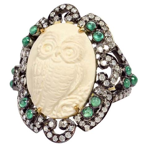Cupid And Angel Cameo Ring With Diamonds And Emeralds Around For Sale