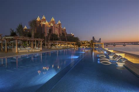 Atlantis The Palm Resort Crescent Rd Dubai Uae White Beach Club Sunset Travoh