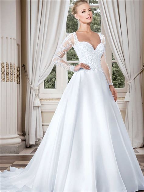 With lace gowns, dresses with sleeves, tulle ballgowns, and plunging necklines, our latest collection features some of the biggest fashion trends for spring and summer weddings. Stunning Sweetheart Long Sleeve Organza Tulle Beaded ...