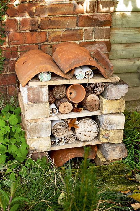 Making a bug hotel encourages biodiversity in the garden. 23 Ideas For A Super Cool Backyard | Bug hotel, Gardens ...