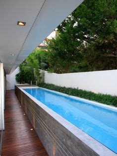 Above ground swimming pools are a lot more fun with a deck. above ground lap pool prices - Google Search | Backyard pool, Modern pools, Pool houses