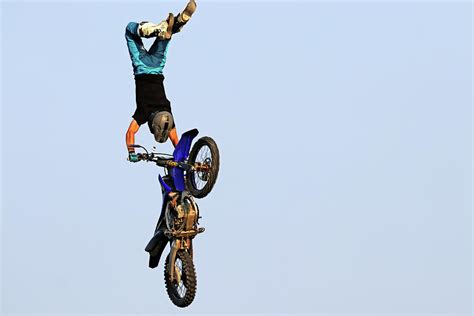 Dirt Bike Stunts In The Air Xii Photograph By Debbie Oppermann Pixels