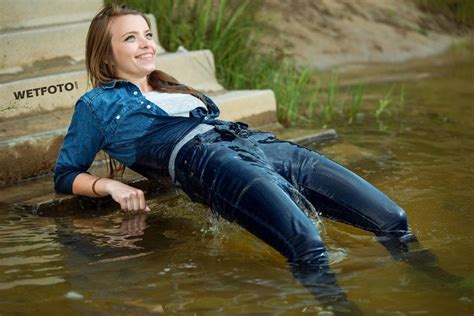 Pin On Wetlook By Smiling Girl In Wet Tight Jeans And Gray T Shirt Without Bra In The Lake