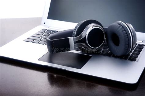 Headphones On A Laptop Computer Stock Photo Image Of Earphones