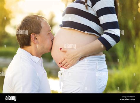 Man Kissing Pregnant Wife Hi Res Stock Photography And Images Alamy