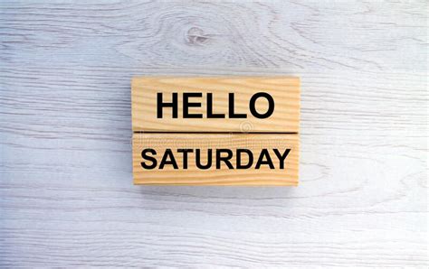 Hello Saturday Text On Black Letter Board And Bouquet Colorful Flowers