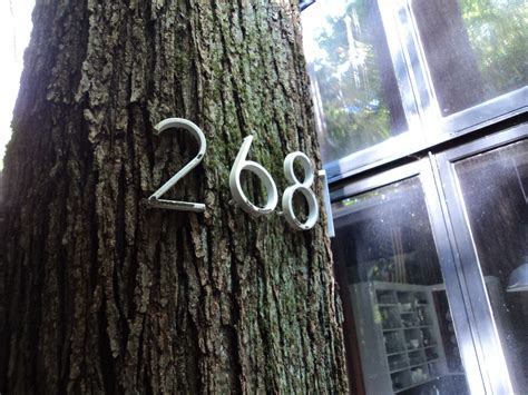 Are there any numbers that should not be in a house address? No one can see our house numbers because of all the trees ...