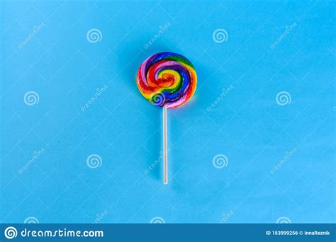 Rainbow Colorfull Lollypop On Blue Background Stock Photo Image Of