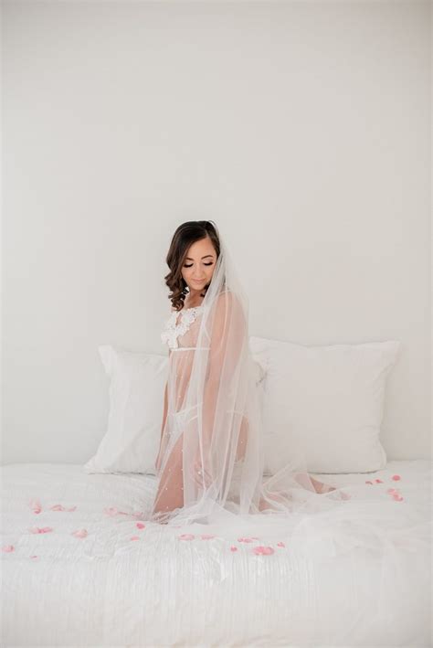 elegant bridal boudoir with long veil the white wren