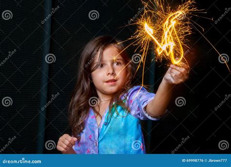 Girl With Sparkler Stock Photo Image Of Cirlcles Glowing 69998776