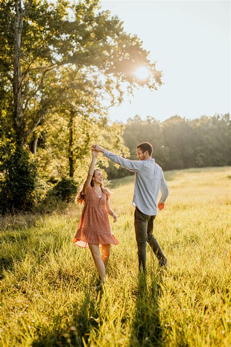 Summer Engagement Pictures Dancing And Twirling Pose Couple Picture