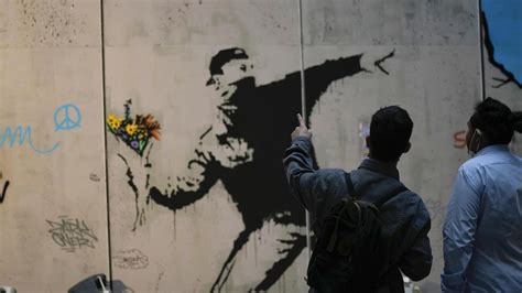 Banksy Encourages Followers To Shoplift From Guess Store In London After It Uses His Artwork