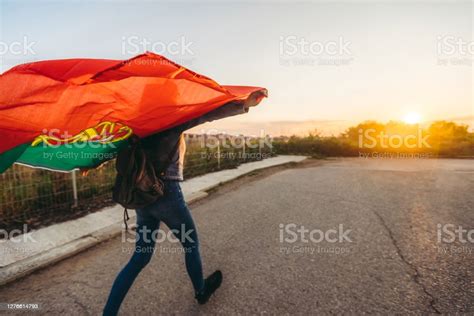 Woman Spreading Portuguese Flag Outdoor Stock Photo Download Image