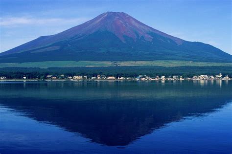 Mount Fuji From Lake Yamanaka In Summer Time When The Red Slopes Are