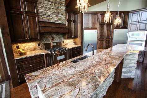 Rustic Kitchen With Exotic Granite Counter Tops Custom Cabinetry And