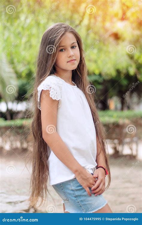 Beautiful School Girl With Long Hair In The Park Prety Girl Wi Stock