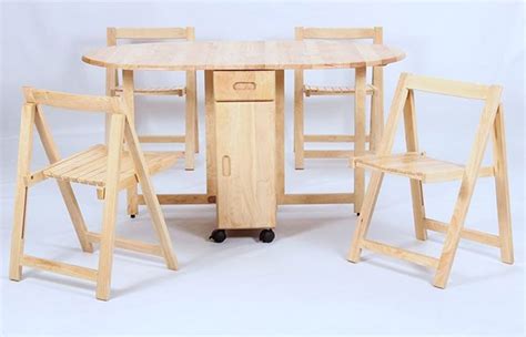 Dining tables are usually rectangular but this doesn't mean that a round table for example can't be as functional and practical as the usual ones. 20 Drop Leaf Table with Folding Chairs | Home Design Lover