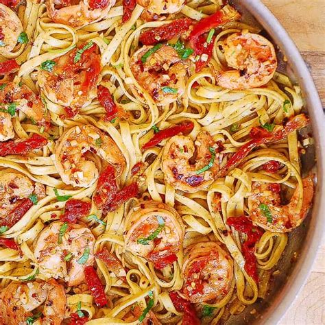 Shrimp scampi pasta just like you order at your favorite italian restaurant with a butter wine sauce with tons of garlic and parmesan cheese. Shrimp Scampi Pasta with Sun-Dried Tomatoes - Julia's Album