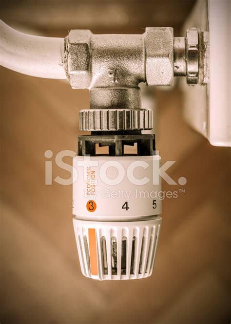 Heating Radiator With Regulator Stock Photo Royalty Free Freeimages