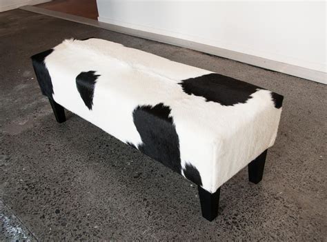 A Beautiful Modern Black And White Cowhide Ottoman By Gorgeous