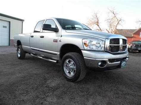 Assuming he bought a truck because he has use for one he will find the longer bed more useful. Find used 2007 Dodge Ram 2500 SLT HEAVY DUTY QUAD CAB LONG ...