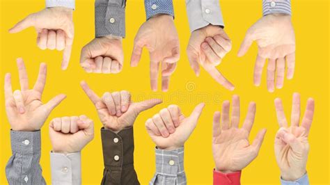 Various Gestures Of Male Hands Between Each Other On A Yellow