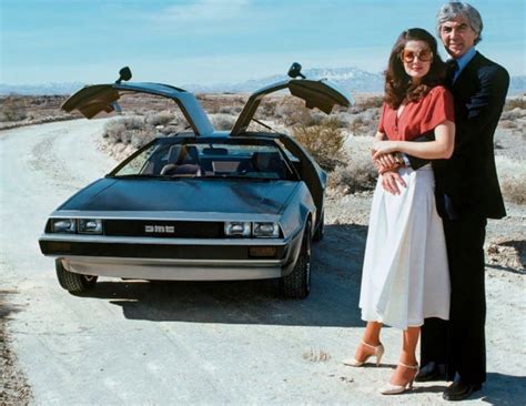 John Delorean And His Wife Cristina Ferrare Beside His Namesake Car
