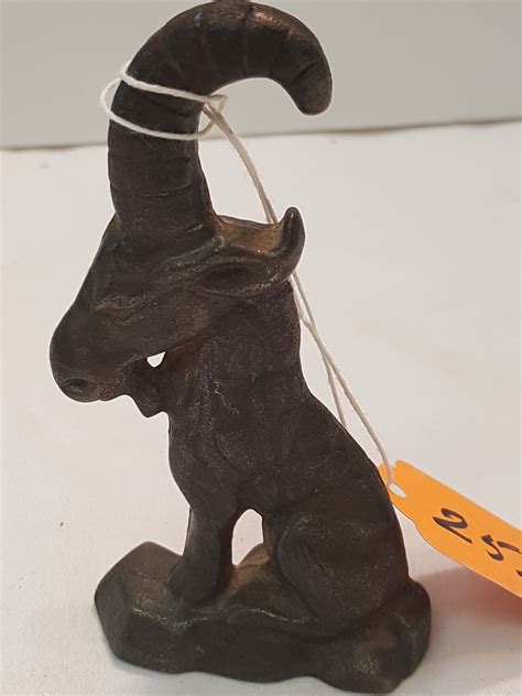 A bottle opener is a device that enables the removal of metal bottle caps from glass bottles. Antique Cast Iron Bottle Opener -very rare
