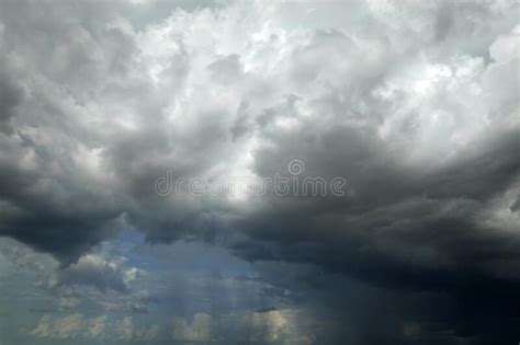 Landscape Of Dark Ominous Clouds Forming On Stormy Sky During Heavy