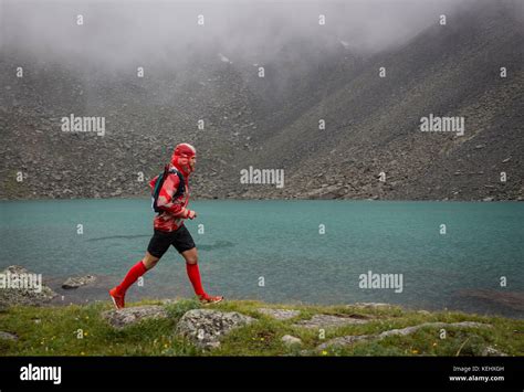 Man Trail Running In The Mountain In Altai Russia Stock Photo Alamy