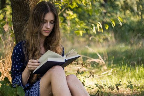 Girl Reading A Book In Summer Forest High Quality People Images