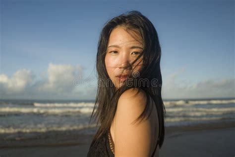 Beautiful Asian Woman Enjoying Sand And Sea Young Happy And Attractive Korean Girl In Bikini
