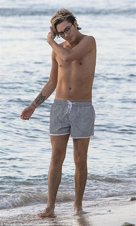 George Shelley Goes Shirtless As He Larks Around With Female Companion