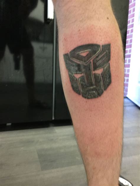 Finding a tattoo design that you want inked on your skin forever is a process. Transformer tattoo | Transformer tattoo, Tattoos, Body art