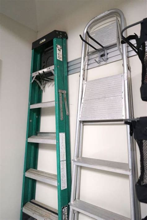 How To Hang A Ladder In The Garage Garage Organization Diy Garage