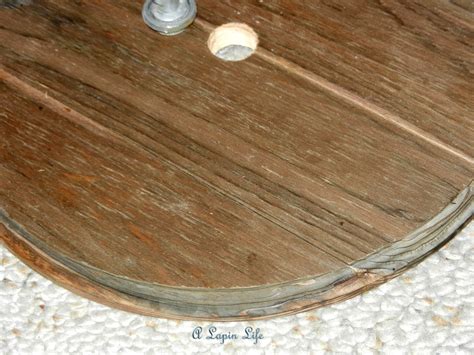 It looks so warm and rustic which is right up my alley. A Lapin Life: Barn-Wood Ceiling Medallion...You Can Make ...