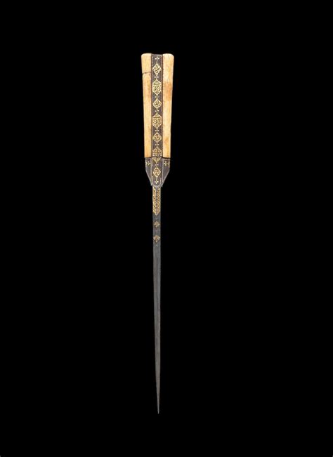 bonhams a fine walrus ivory hilted gold damascened steel dagger kard persia 18th century