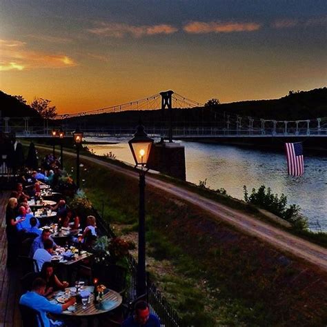 Outdoor Dining At Dusk At The Black Bass Hotel Captured By