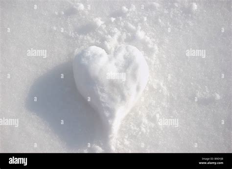 Heart Shape In Snow Stock Photo Alamy