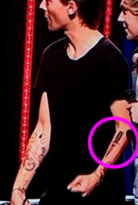 Louis Tomlinson Tattoos Meanings A Complete Tat Guide