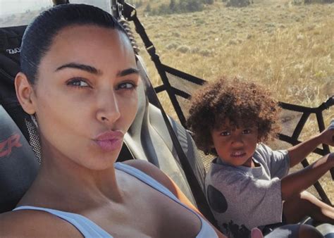 saint west is adorable in a buggy with mom kim kardashian celebrity insider