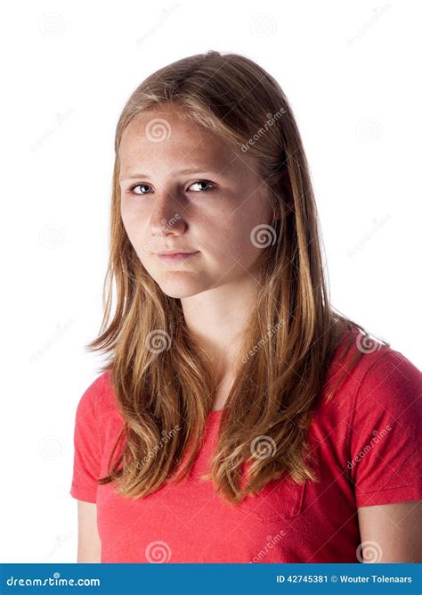 Beautiful Teenage Girl Looking Seriously Into The Camera Stock Image
