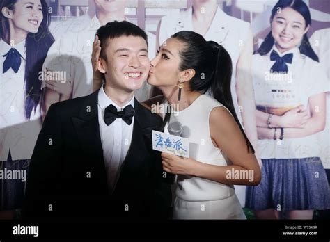 Chinese Actress Li Bingbing Right Kisses Chinese Actor Dong Zijian