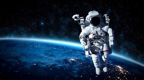Premium Photo Astronaut Spaceman Do Spacewalk While Working For Space