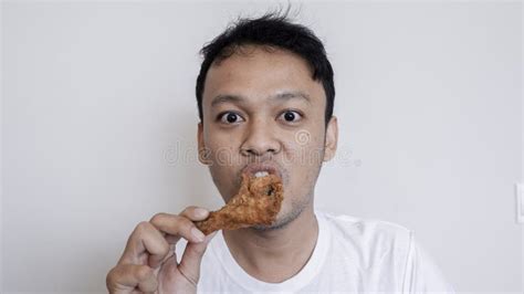 137 Asian Fat Man Eating Fried Chicken Stock Photos Free And Royalty