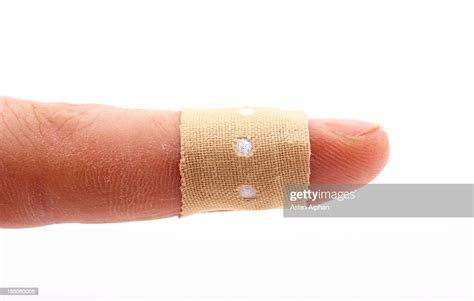 Human Finger With Bandage High Res Stock Photo Getty Images
