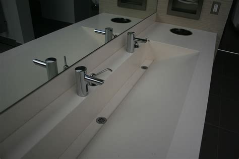 There are seemingly endless choices available for bathroom sinks and vanity cabinets. One Long Sink Two Faucets