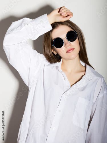 Naked Girl In A Man S White Shirt With Sunglasses Stock Photo And