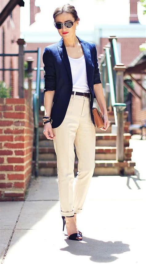 Womens Fashion Wearing A Navy Blue Classic Blazer Beige