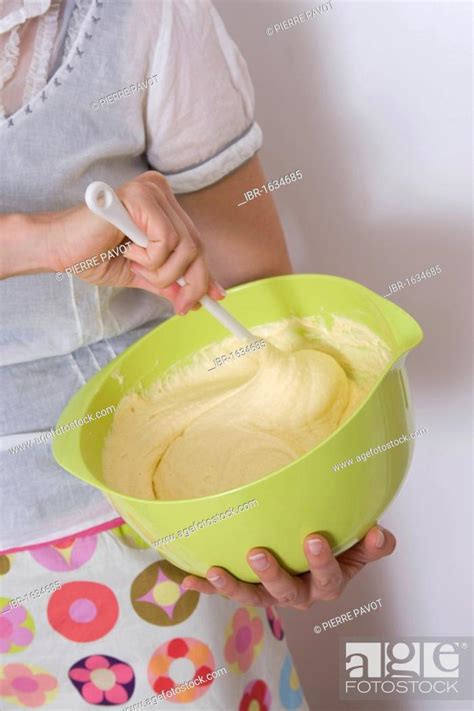 Woman Stirring A Cake Mix Stock Photo Picture And Rights Managed